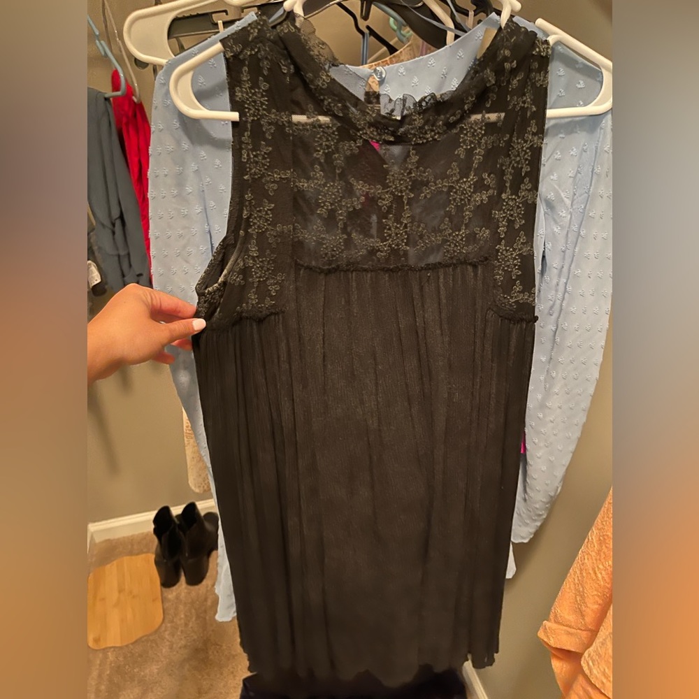 Distressed black dress. Sleeveless size Small.